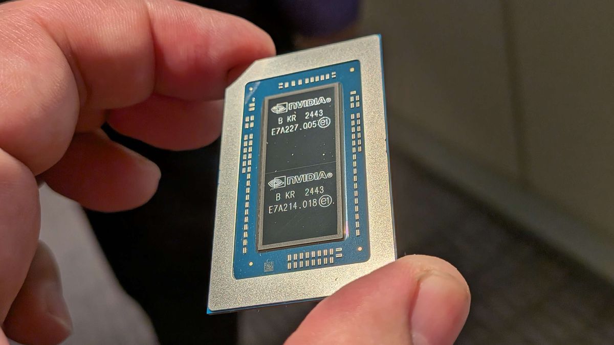 Dave holding an Nvidia RTX Spark chip in his hand