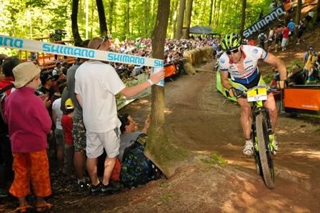 Jose Antonio Hermida (Multivan Merida) rounds a corner lined with spectators in Offenburg