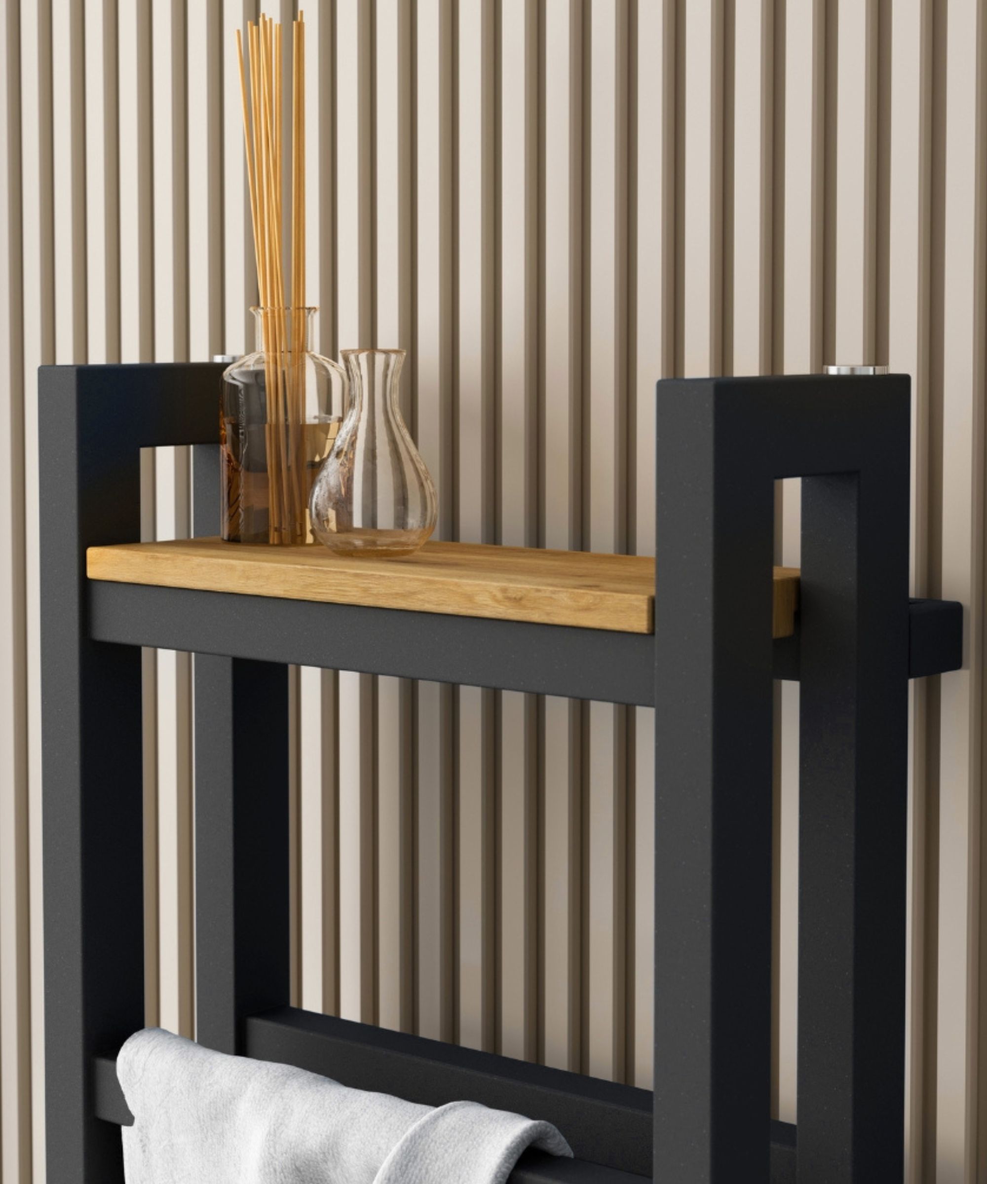 Contemporary radiator design with a built-in wooden shelf, styled with glass jars and reed diffusers for a spa-like finish.