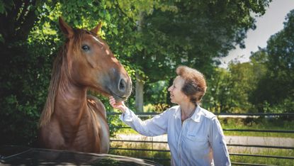 Princess Anne with one of her Suffolk horses