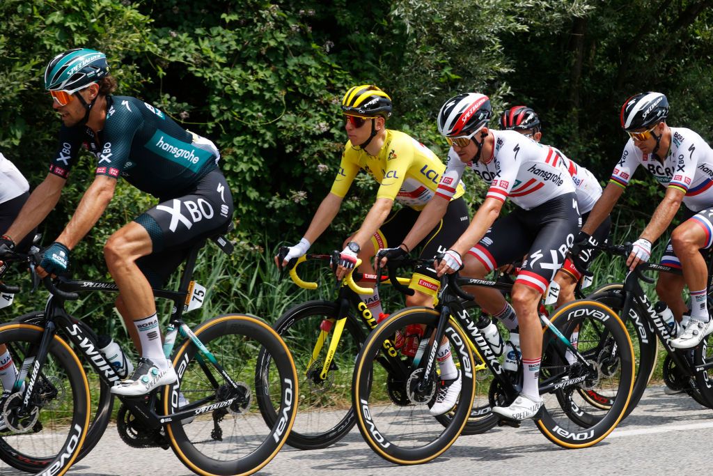VALENCE FRANCE JULY 06 Daniel Oss of Italy and Team BORA Hansgrohe Tadej Pogaar of Slovenia and UAETeam Emirates yellow leader jersey Patrick Konrad of Austria and Team BORA Hansgrohe Peter Sagan of Slovakia and Team BORA Hansgrohe during the 108th Tour de France 2021 Stage 10 a 1907km stage from Albertville to Valence LeTour TDF2021 on July 06 2021 in Valence France Photo by Chris GraythenGetty Images