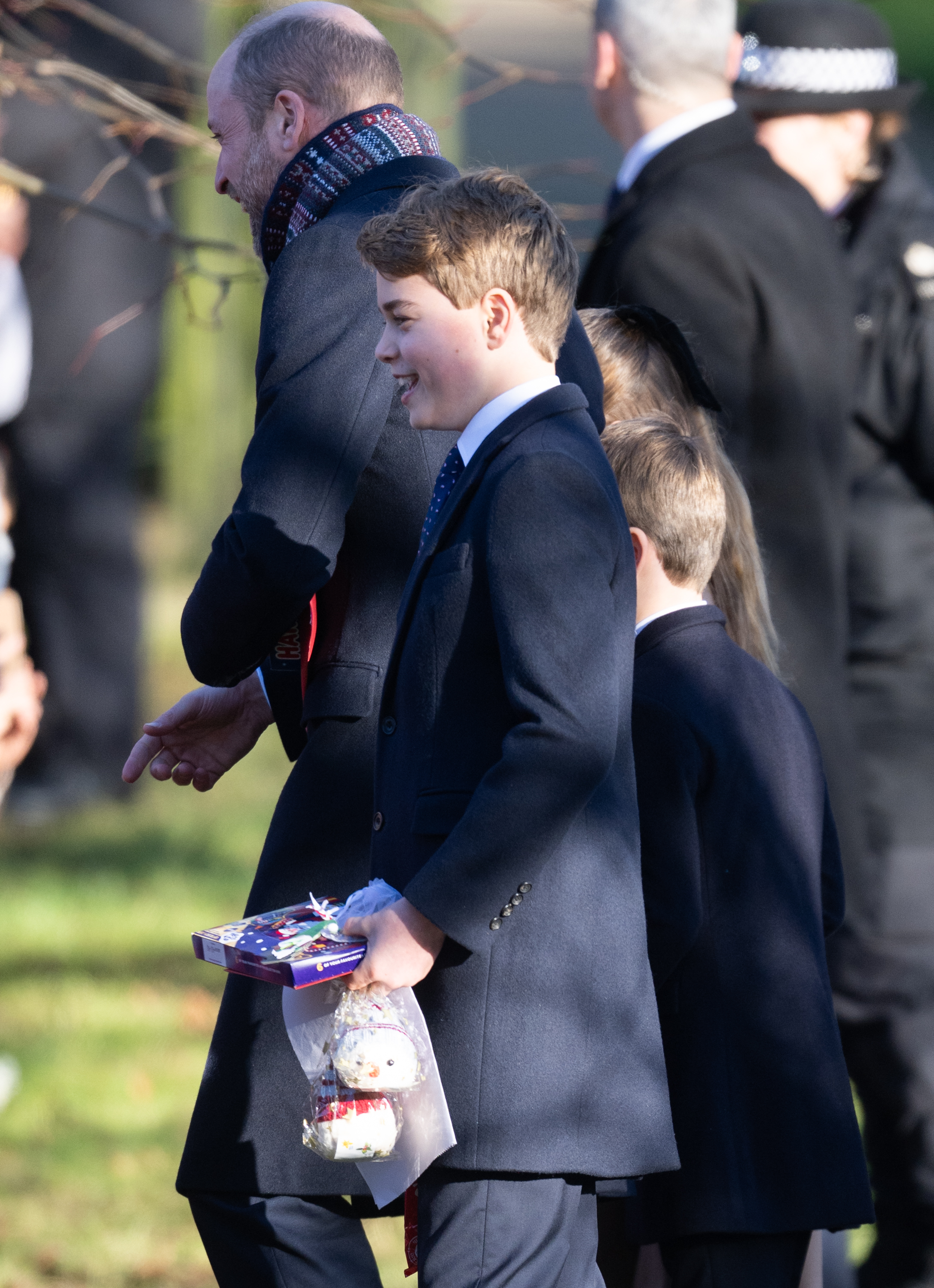 Prince George, Prince William and Prince Louis walking from church on Christmas day