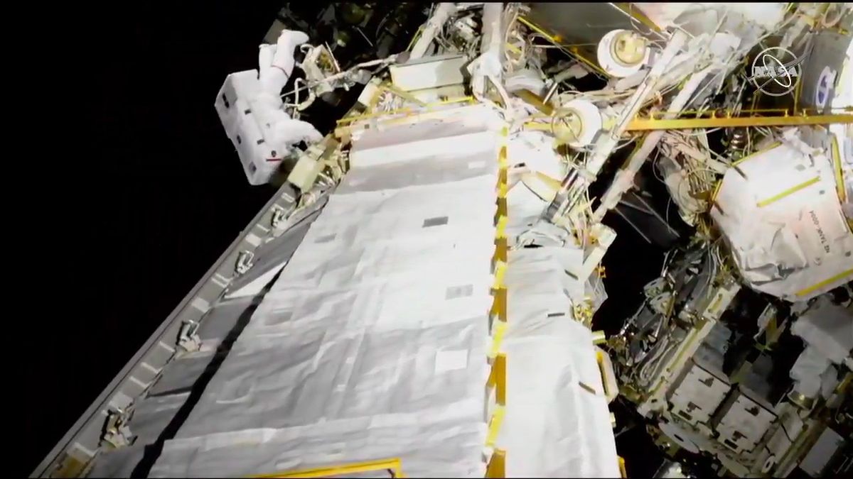 NASA astronaut Anne McClain moves to the S0 truss to store a bag before getting to work with the batteries.
