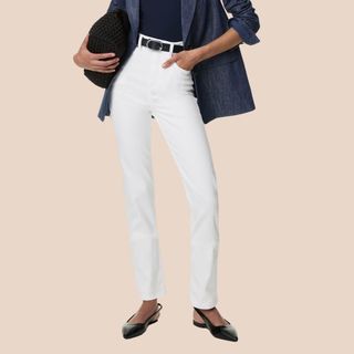 Flat lay image of woman in white jeans 