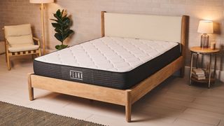 The Plank Firm Mattress with the Extra Firm side upwards, on a wooden bed frame in a bedroom