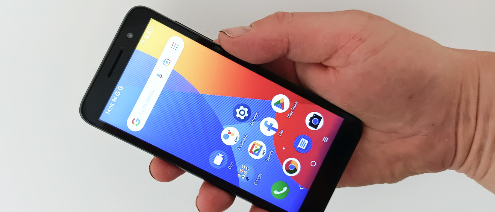 Alcatel 1 smartphone being held in man's hand