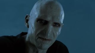Ralph Fiennes as Voldemort looking down at Harry in Harry Potter and the Goblet of Fire.
