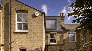 rear of a terraced house with a dormer window