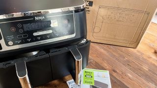 Ninja DZ550 Foodi 6-in-1 10-qt. XL 2-Basket Air Fryer being tested in writer's kitchen