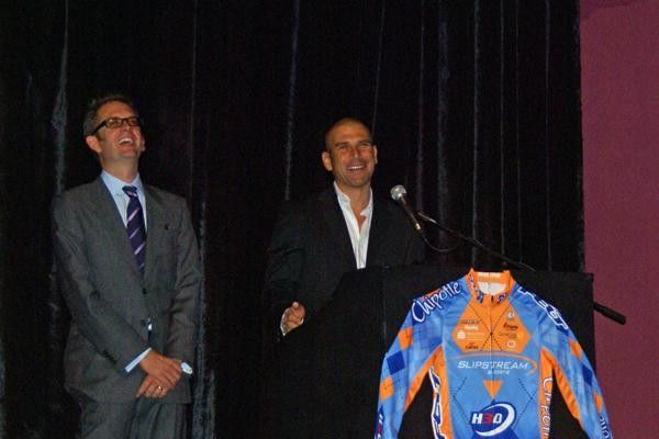 Jonathan Vaughters addresses the crowd with new sponsor Scott Hirshom of H3O.