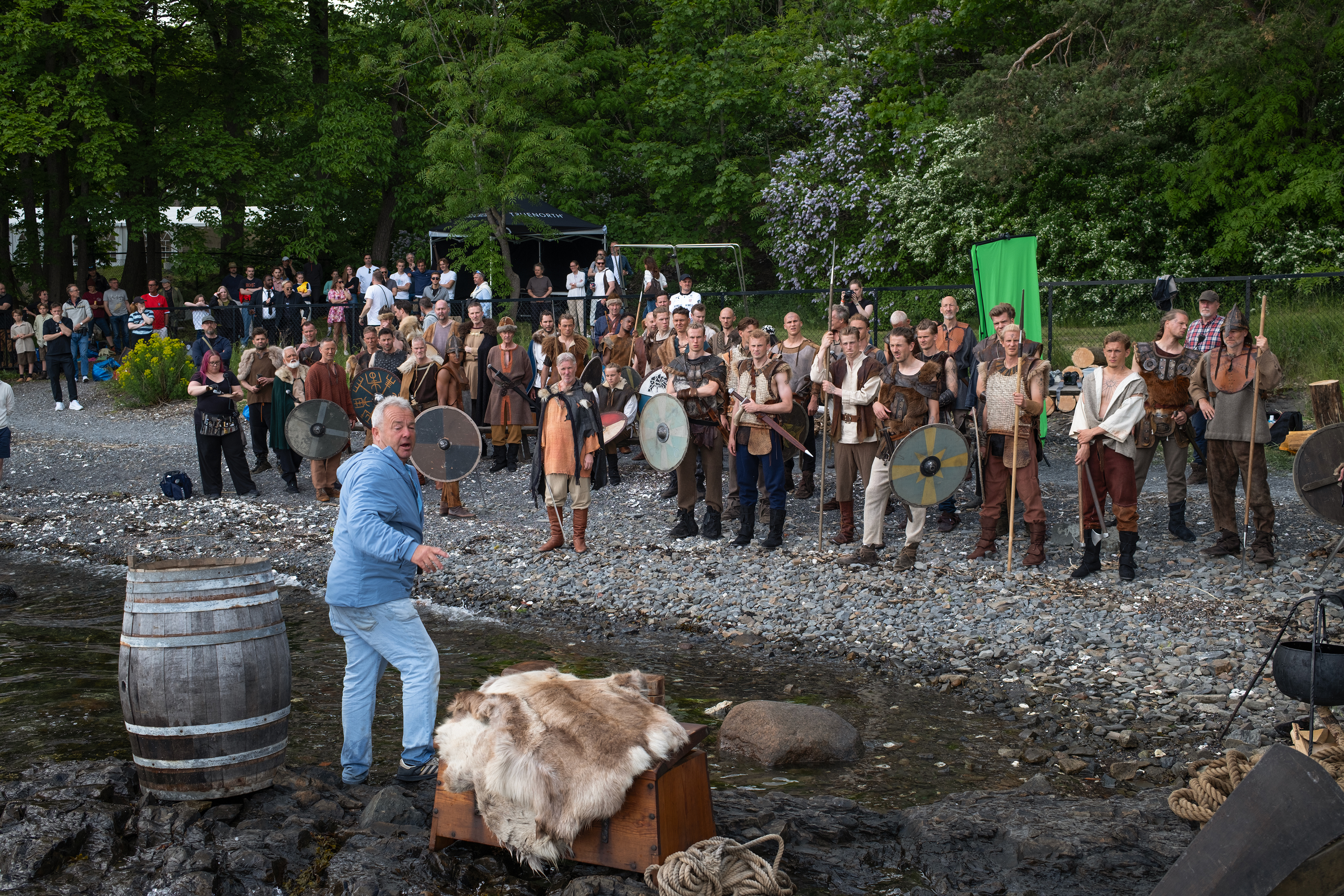 Photographer David Yarrow arranges the Norway FIFA team for a team photo