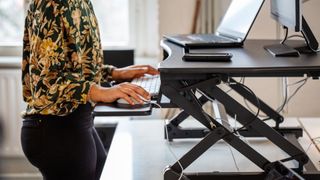 Woman using a standing desk