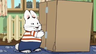 Max pushing a box on Max & Ruby