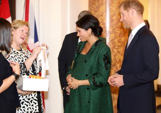 Meghan Markle and Prince Harry are presented with baby gifts by Canadian High Commissioner to the United Kingdom, Janice Charette