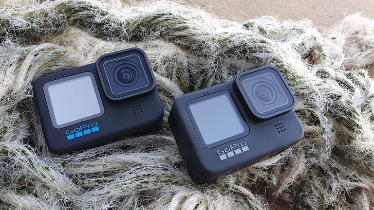 GoPro HERO 10 Black and HERO 9 Black on some ropes on a beach