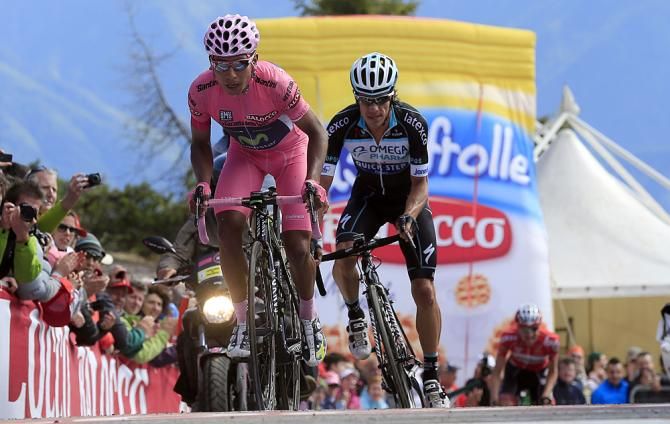 Nairo Quintana (Movistar) comes to the line ahead of Rigoberto Uran (OPQS)