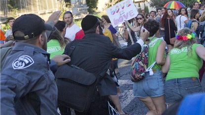 A stabbing at the Jerusalem gay pride parade is captured on camera.