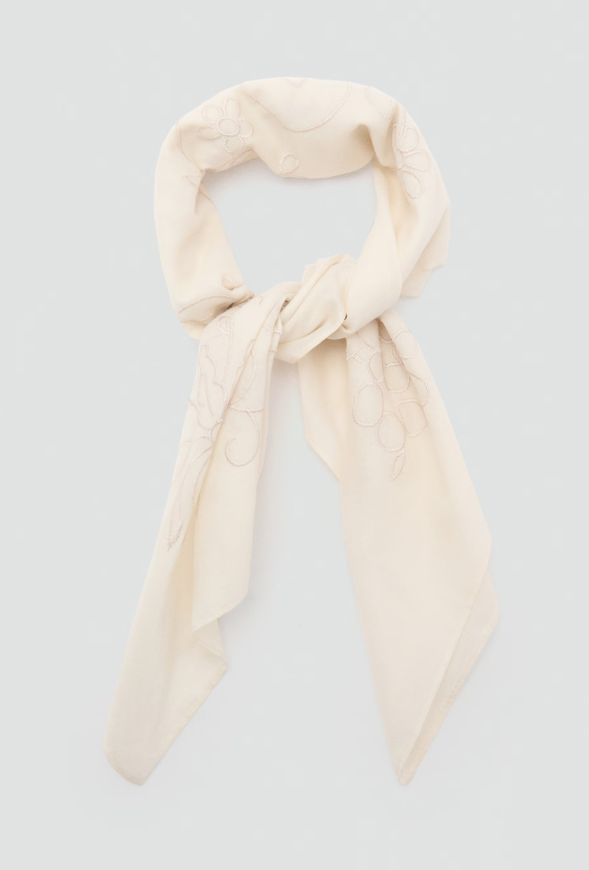 An image of an all white outfit from Mango.