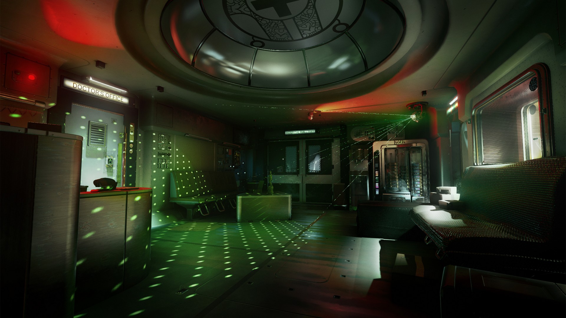 A dark room in a medical wing in Ontos is illuminated by dotted green lights from a ceiling-mounted scanner. A nearby door is labelled 'Doctor's Office', while the waiting room has a desk and lines of chairs.