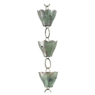 A blue verde rain chain with three scalloped rain holders and chains in between