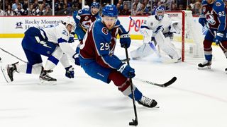 Nathan MacKinnon (29) of the Colorado Avalanche controls the puck in the zone during the first period of game 1 in the 2022 NHL Stanley Cup Finals as the Colorado Avalanche play against the Tampa Bay Lightning at Ball Arena on Wednesday, June 15, 2022.