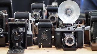 Old cameras on the Disabled Photographers Society stand at the photography and video show