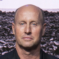 Photograph of South African wildlife photographer Chris Fallows, best known for his fine-art photographs of great white sharks and marine animals, and African mammals