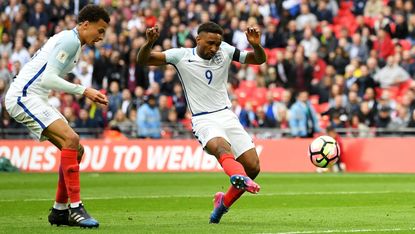 Jermain Defoe scores against Lithuania 