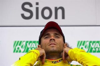 Alejandro Valverde (Caisse d'Epargne) adjusts his collar after winning the 2010 Tour of Romandie