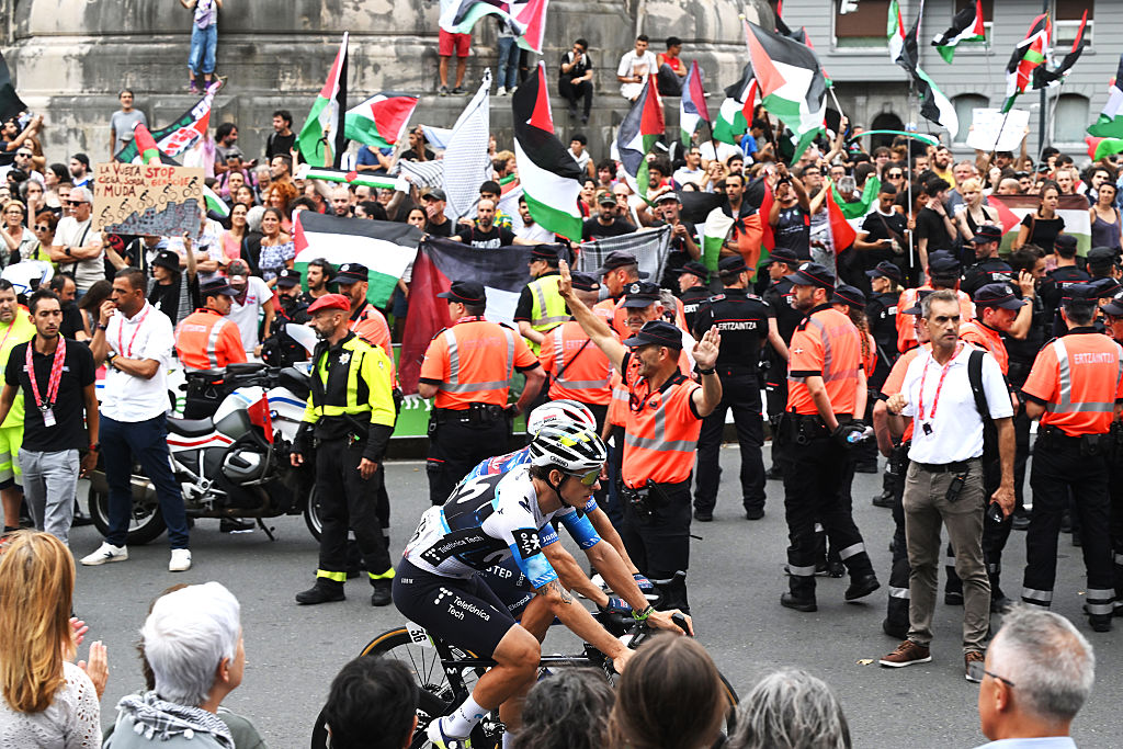 BILBAO, SPAIN - SEPTEMBER 03: Riders redirected due to the presence of pro-Palestinian protesters at the finish line.during the La Vuelta - 80th Tour of Spain 2025, Stage 11 a 157.4km stage from Bilbao to Bilbao / Due to incidents at the finish line, the official times for the GC were taken at 3km from the finish line, there was no stage winner / #UCIWT / on September 03, 2025 in Bilbao, Spain. (Photo by Dario Belingheri/Getty Images)