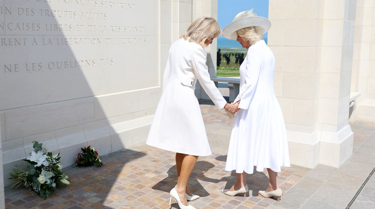 Brigitte Macron and Queen Camilla lay flowers during the UK Ministry of Defence and the Royal British Legion’s commemorative event at the British Normandy Memorial to mark the 80th anniversary of D-Day on June 06, 2024 in Ver-Sur-Mer, France.