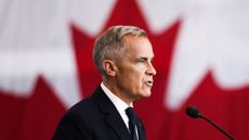 Canadian Prime Minister Mark Carney speaks as he attends a tour of the Fort York Armoury in Toronto
