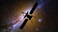 An image of the shadowy outline of a satellite against the stars of the Milky Way