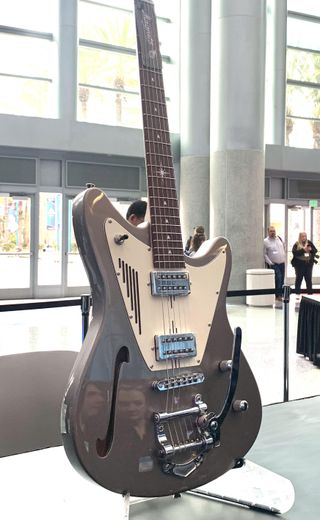 Magneto's Starlux guitar, on display at the 2023 NAMM show