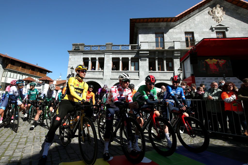 VIANA SPAIN APRIL 05 LR Primoz Roglic of Slovenia and Team Jumbo Visma Yellow Leader Jersey Remco Evenepoel of Belgium and Team QuickStep Alpha Vinyl Polka Dot Mountain Jersey Geraint Thomas of United Kingdom and Team INEOS Grenadiers Green Points Jersey and Ben Tulett of United Kingdom and Team INEOS Grenadiers Blue Best Young Rider Jersey prior to the 61st Itzulia Basque Country 2022 Stage 2 a 2076km stage from Leitza to Viana 461m itzulia WorldTour on April 05 2022 in Viana Spain Photo by Gonzalo Arroyo MorenoGetty Images