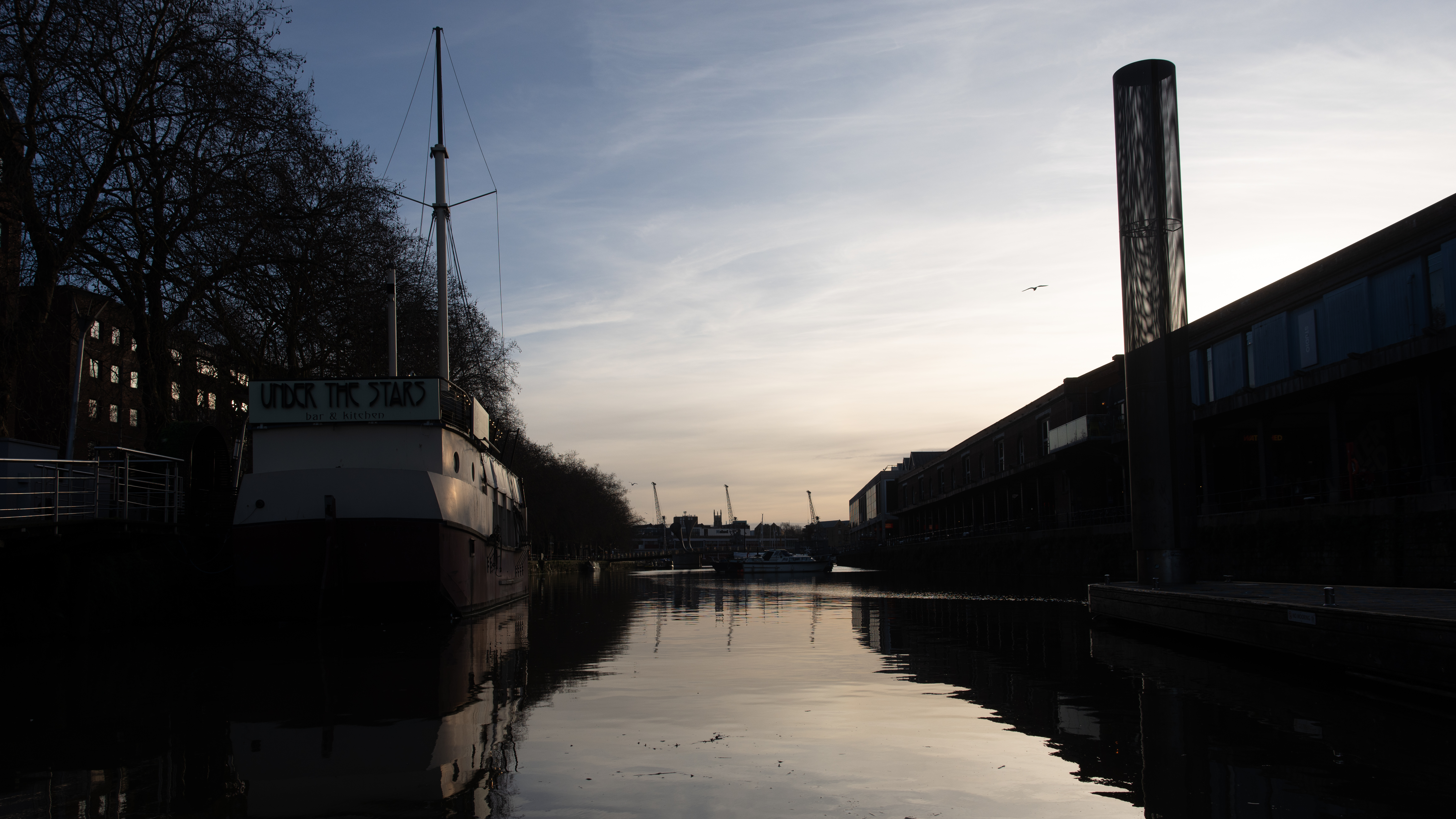 A wide-angle shot of Bristol Harbour taken at sunset