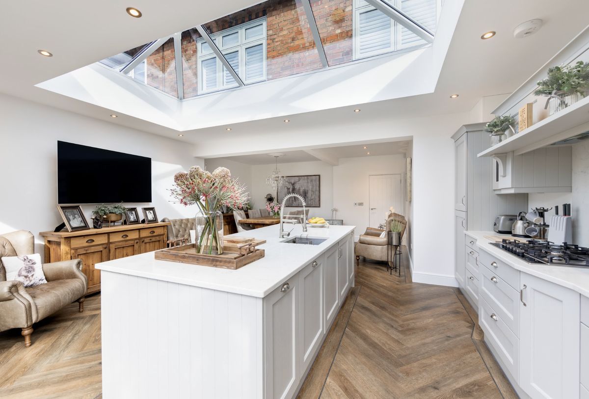 A kitchen extension with a rooflight and a large kitchen island