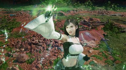 Tifa where's a mage-like outfit as her hand glows green in Final Fantasy 7 Revelation
