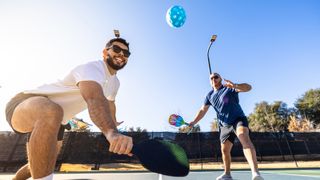 Group of friends playing pickleball.