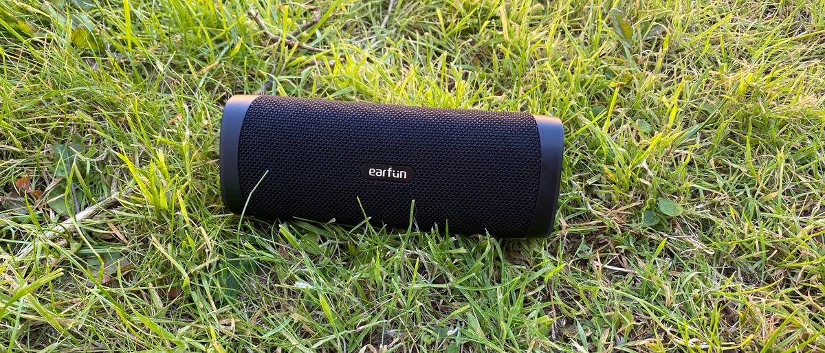 Earfun UBoom L speaker on grass