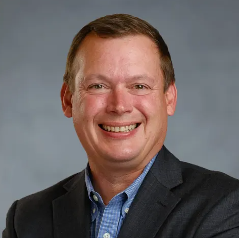 Smiling headshot of Josh Braun.