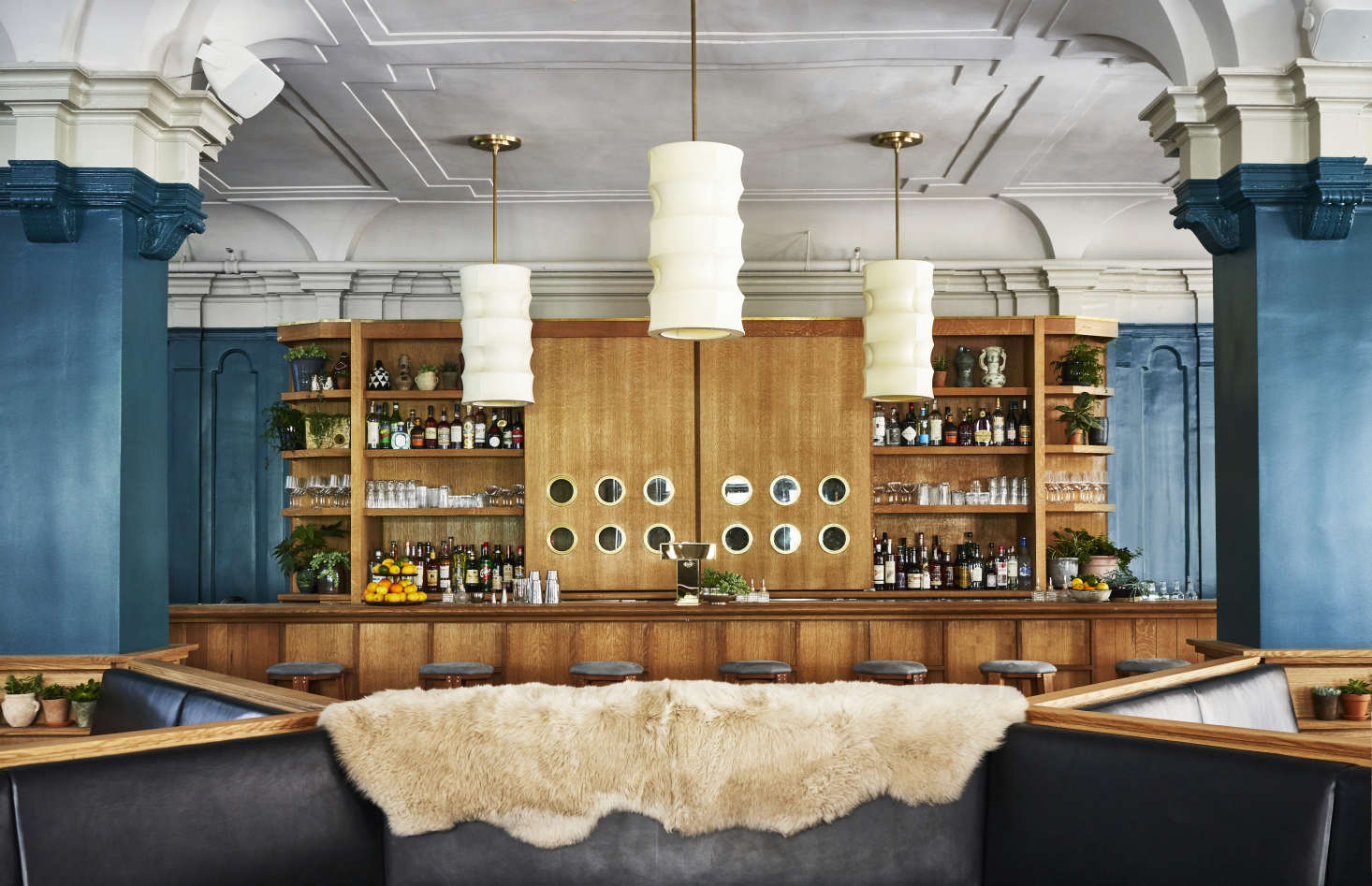 A nostalgically designed hotel fuses college dorm aesthetic with a mid-century furniture-led style.