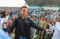 MOGADISHU, SOMALIA - JUNE 10: Somali referee Omar Abdulkadir Artan greets fans who show support for him, after he was denied entry into the United States where he had traveled to take part in the World Cup organization and was forced to return to his country, in Mogadishu, Somalia on June 10, 2026. (Photo by Abuukar Mohamed Muhidin/Anadolu via Getty Images)