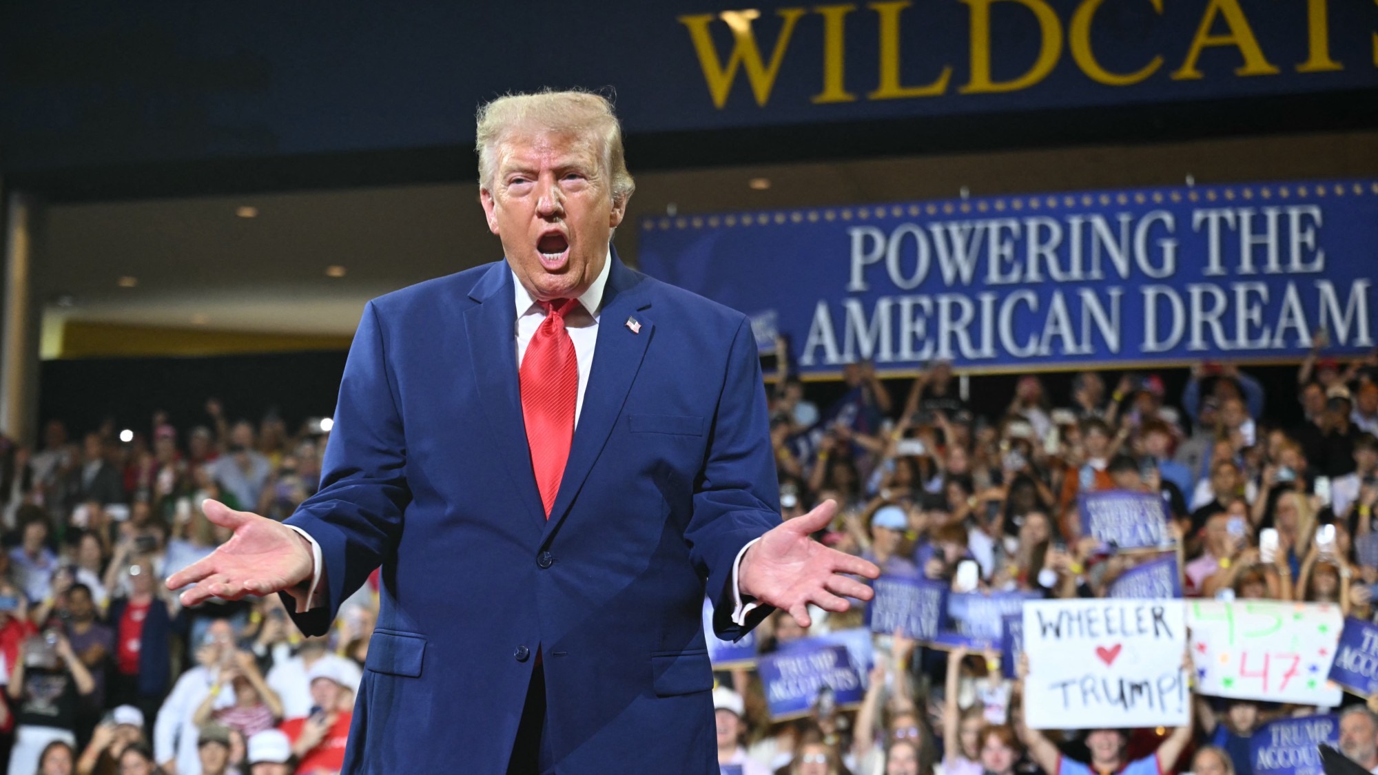 Donald Trump arrives to speak at Wheeler High School in Marietta, Georgia