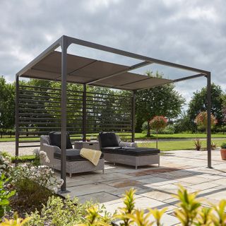 freestanding canopy with sun loungers
