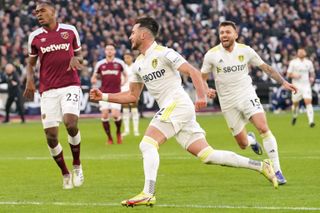 Jack Harrison (centre) scored a hat-trick as Leeds won at high-flying West Ham.