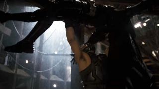 Bane (Tom Hardy) preparing to break Batman's (Christian Bale) back in The Dark Knight Rises