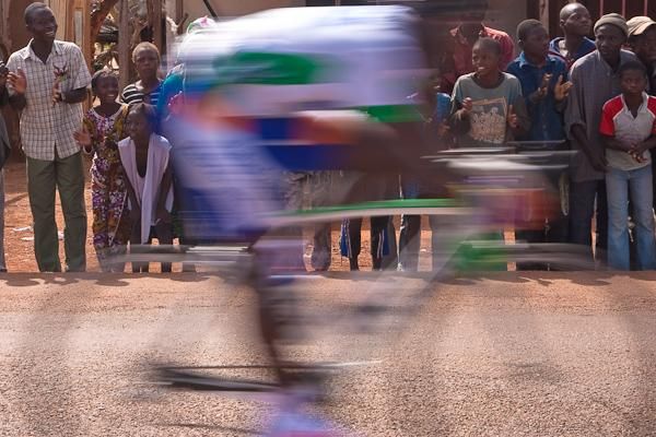 Riders are a blur to the local fans.