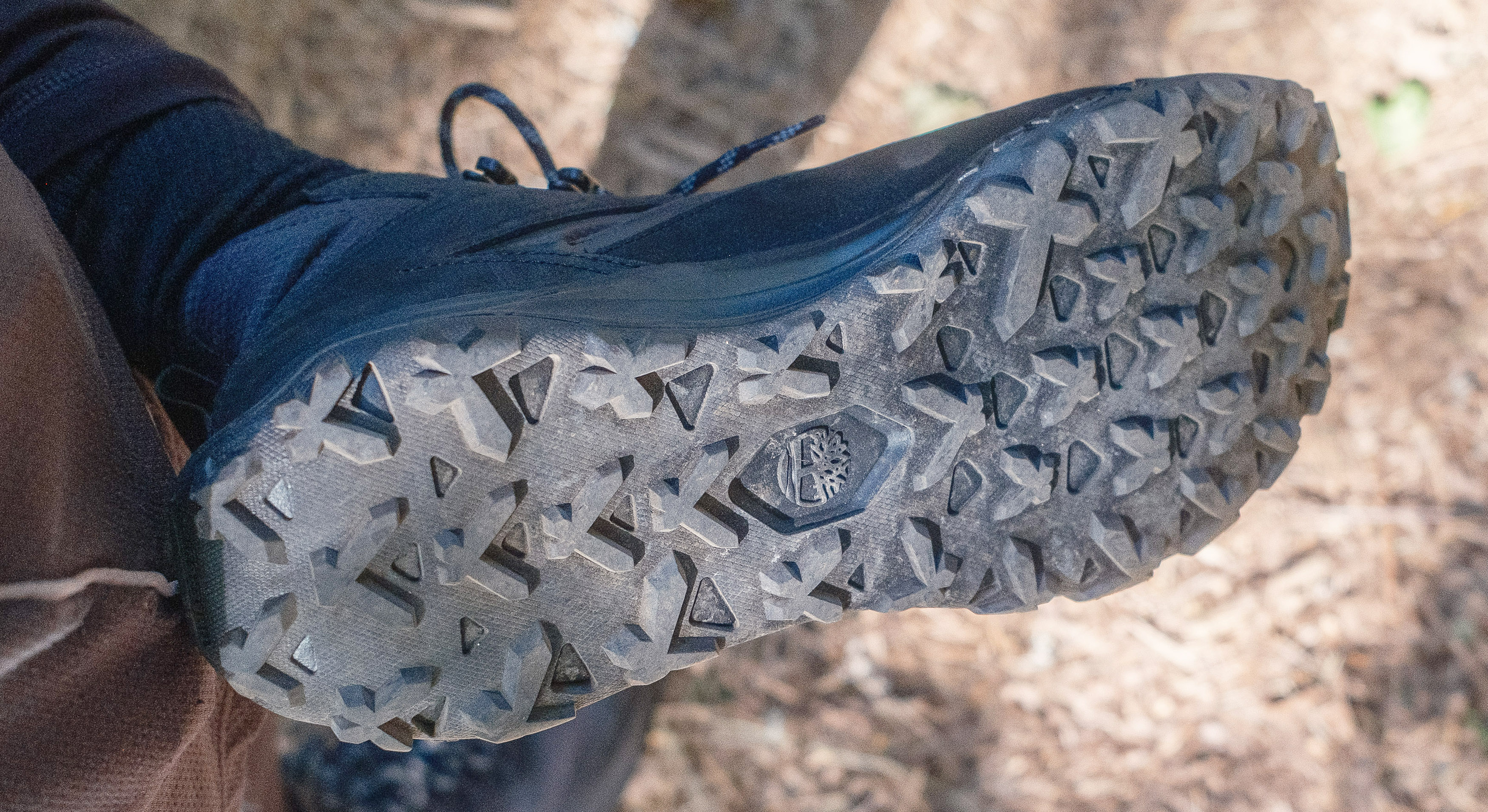 Close-up of the outsole of the Timberland Motion Access Mid Waterproof Sneakers (black)
