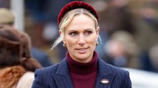 Zara Tindall, wearing a pinstripe suit, attends the New Year's Day Racing Meet at Cheltenham Racecourse on January 1, 2025